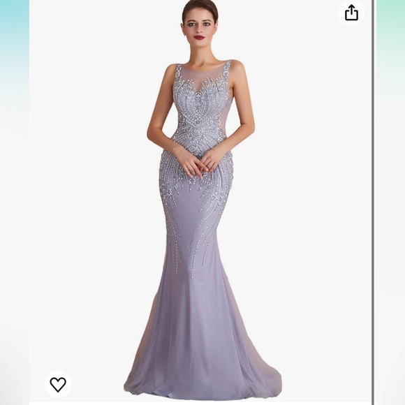 Never worn. Light purple Mermaid Evening Gown. Comes with sewn in cups. Size 14